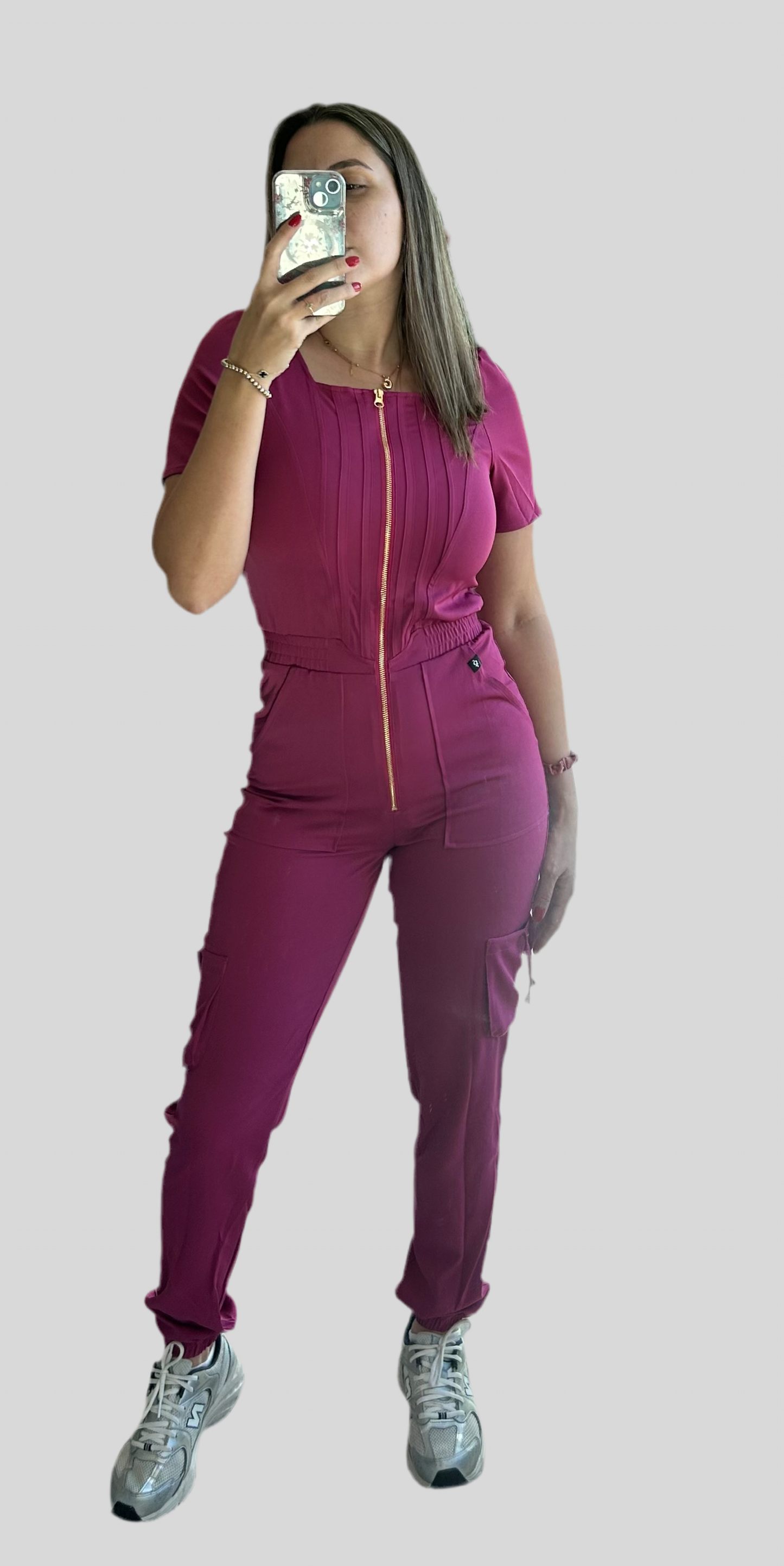 Zoe (jumpsuit con zipper dorado, elástico en el tobillo).